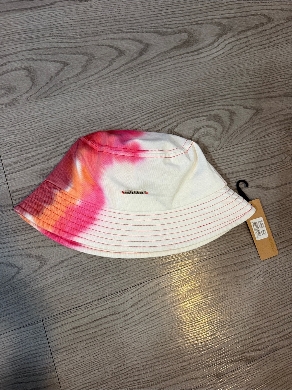 Steve Madden White Bucket Hat with Pink Tie-Dye Accent